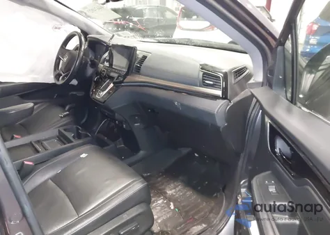 2021 Honda Odyssey Touring z USA, uszkodzony, nr VIN 5FNRL6H86MB030381